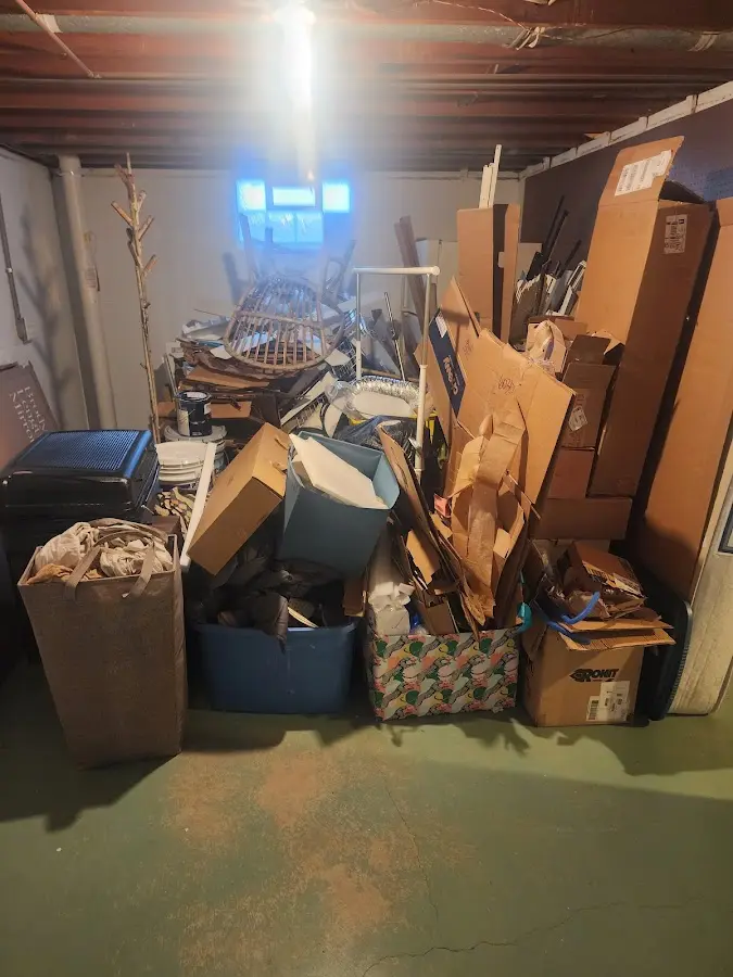 Roll-off dumpster container at job site for 2 Yard Dumpster Rental in Acme